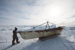 Seven-year old Steven Reich examines his father’s umiaq, or skinboat used for whaling. His father Tad, captain of Yugu crew, expresses nervous excitement to bring Steven out whaling on the ice for the first time: “I am proud of my son; he’s here to learn to be a hunter.”